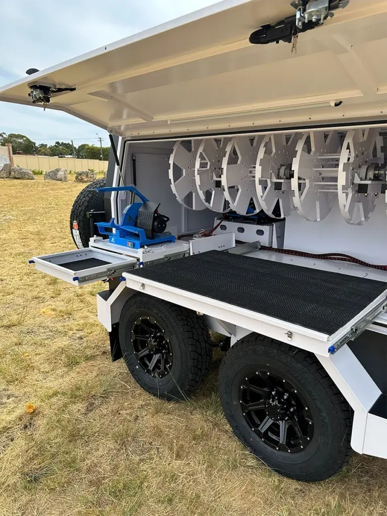 Workbench and equipment space inside a RedDirt Hydraulic Repair Trailer