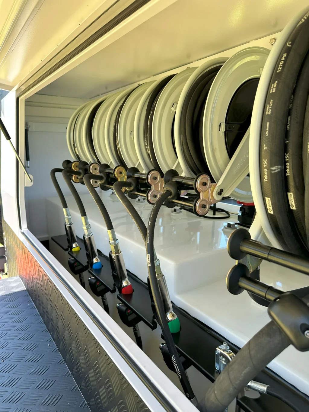 Hose reels and fitted equipment inside a RedDirt Service Trailer