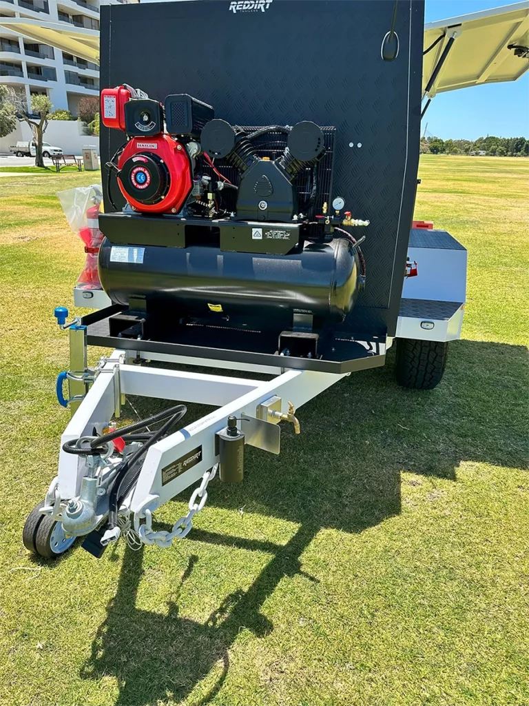 Mine spec diesel air compressor mounted on the RedDirt service trailer for on-site air supply