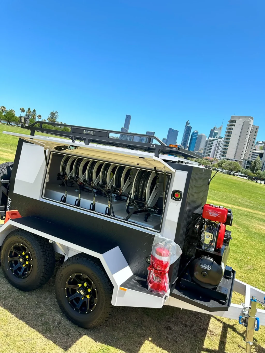 RedDirt Service Trailer with oil tanks and hose reels