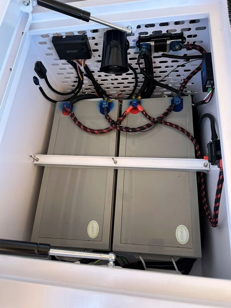 Protected trailer wiring and battery box