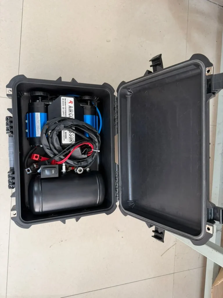 Twin air compressor with 10 litre air tank mounted on the RedDirt trailer for on-site compressed air